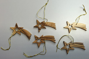 Ordine: “Stelline“ decorative in legno d‘ulivo Ordine: “Stelline“ decorative in legno d‘ulivo
